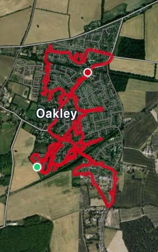 Aerial GPS-recorded route map showing a leaflet round through the streets of Oakley village